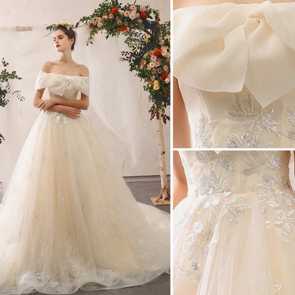 Élégant Champagne Robe De Mariée 2020 Princesse De l'épaule Noeud En Dentelle Fleur Appliques Manches Courtes Dos Nu Cathedral Train