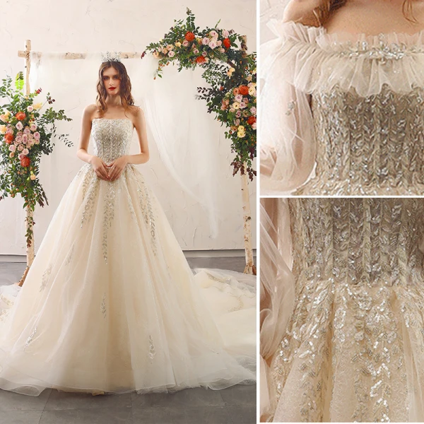 Charmant Champagne Robe De Mariée 2020 Princesse Bustier Perlage Paillettes En Dentelle Fleur Dos Nu Volants Manches Longues Cathedral Train