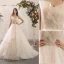 Charmant Champagne Robe De Mariée 2020 Princesse Bretelles Spaghetti Perlage Paillettes En Dentelle Fleur Sans Manches Dos Nu Noeud Volants en Cascade Tribunal Train