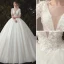 Elegant Ivory Wedding Dresses 2020 Ball Gown Deep V-Neck Pearl Lace Flower Appliques Short Sleeve Backless Cathedral Train