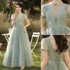 Elegant Ivory Brudekjoler 2018 Havfrue Blonde Beading Pailletter Halter Halterneck Kort Ærme Retten Tog Bryllup
