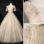 Élégant Conte de fée Champagne Robe De Bal 2020 Robe Boule Encolure Dégagée Faux Diamant En Dentelle Fleur Appliques Manches Courtes Dos Nu Longue Robe De Ceremonie