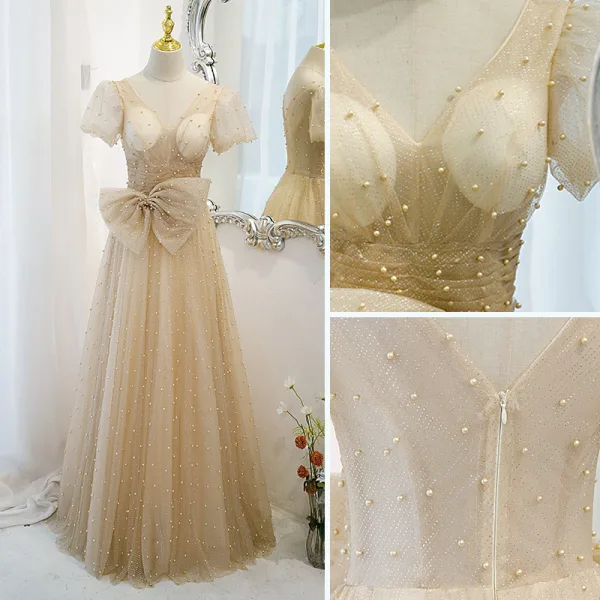 Élégant Champagne Robe De Bal Princesse 2021 V-Cou Noeud Paillettes Perle Manches Courtes Dos Nu Longue Robe De Ceremonie
