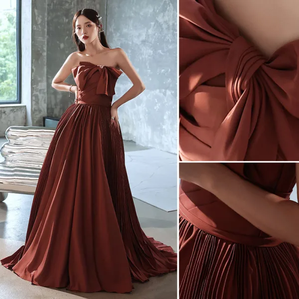 Charmant Café Satin Robe De Bal 2022 Princesse Bustier Noeud Sans Manches Dos Nu Train De Balayage Robe De Ceremonie