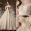 Charmant Champagne Robe De Mariée 2020 Princesse Encolure Dégagée Perlage Paillettes En Dentelle Fleur Manches Courtes Dos Nu Cathedral Train