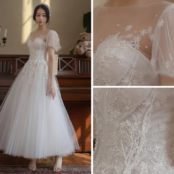 Élégant Ivoire Robe De Mariée 2021 Princesse Encolure Dégagée Perle En Dentelle Fleur Manches Courtes Dos Nu Longue Mariage