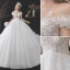 Mode Ivoire Robe De Mariée 2021 Robe Boule Encolure Dégagée Perlage Appliques En Dentelle Fleur Perle Paillettes Manches Courtes Dos Nu Royal Train Mariage