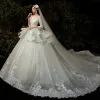 Illusion Champagne See-through Bridal Wedding Dresses 2020 Ball Gown Scoop Neck 3/4 Sleeve Appliques Lace Beading Glitter Tulle Backless Cathedral Train Ruffle