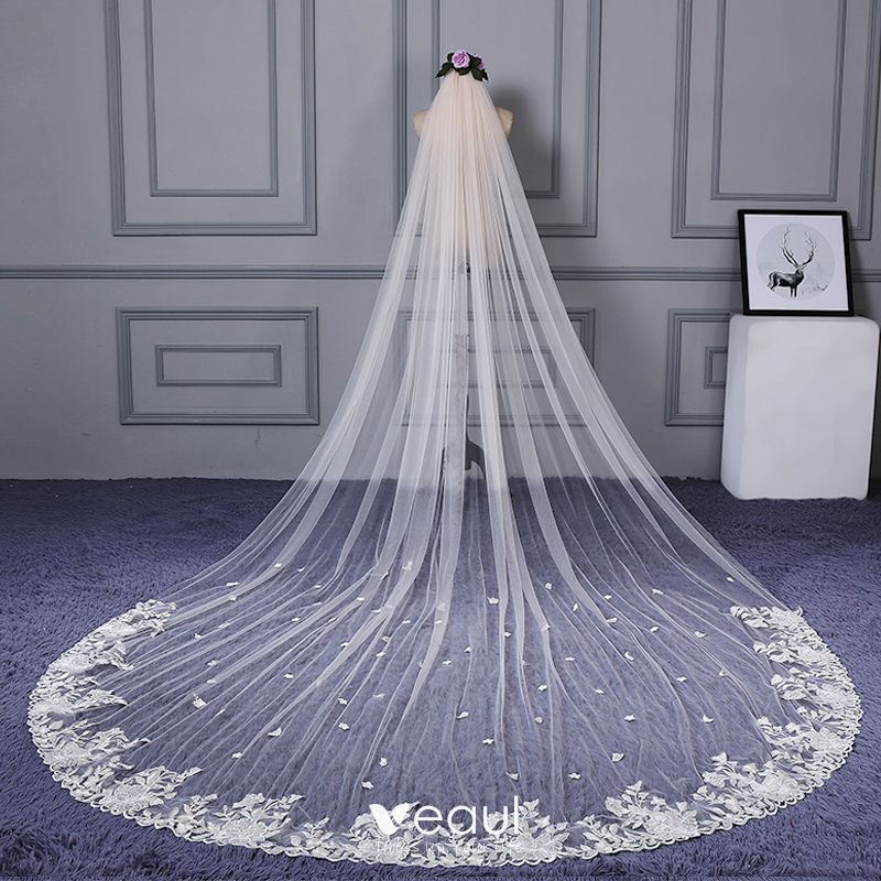 https://img.veaul.com/product/1aeb4e2bc415861875c92213cfb75eec/classic-elegant-white-cathedral-train-wedding-tulle-lace-appliques-wedding-veils-2018-800x800.jpg
