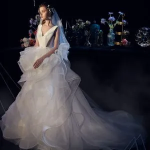 Charming Ivory Wedding Dresses 2019 Ball Gown V-Neck Sequins Cascading Ruffles Sleeveless Backless Court Train