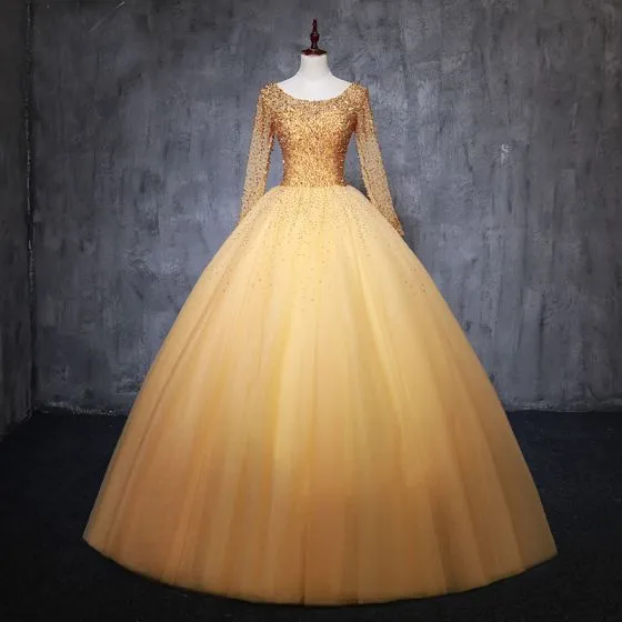 gold long sleeve ball gown