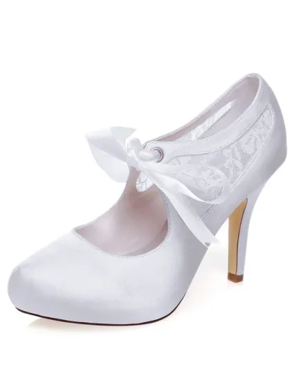 white pumps with bow