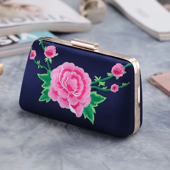pink and navy clutch bag