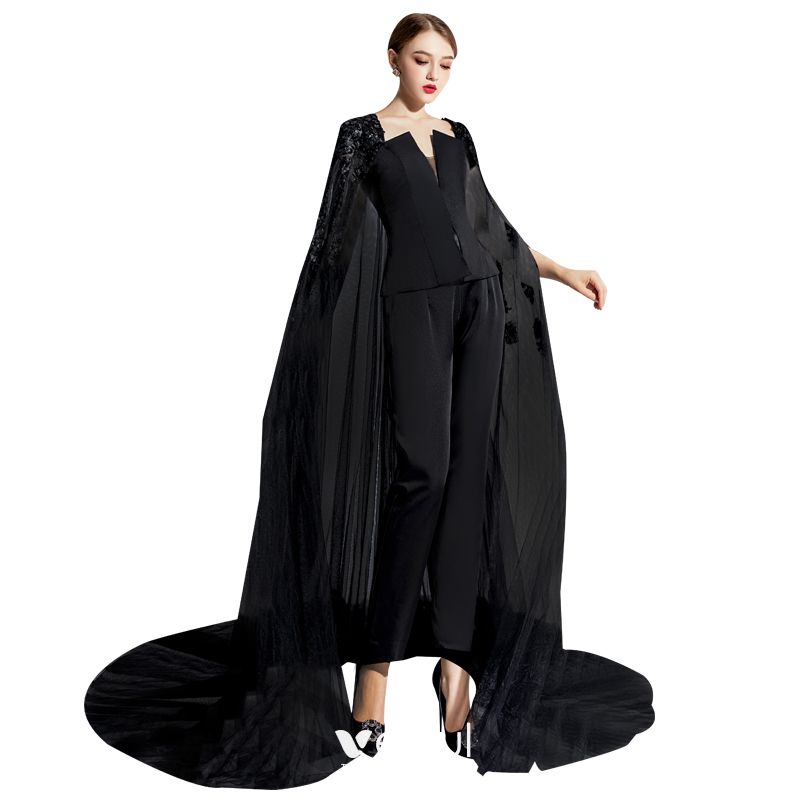 black jumpsuit with train