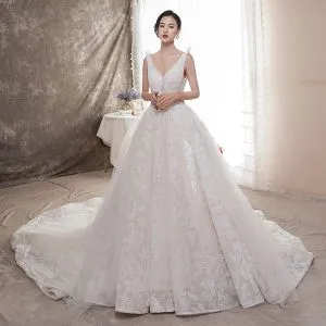 Best Champagne Wedding Dresses 2019 A-Line / Princess Deep V-Neck Sleeveless Backless Appliques Lace Beading Chapel Train Ruffle