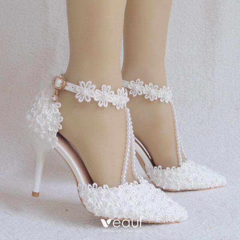 high heels with pearls on them
