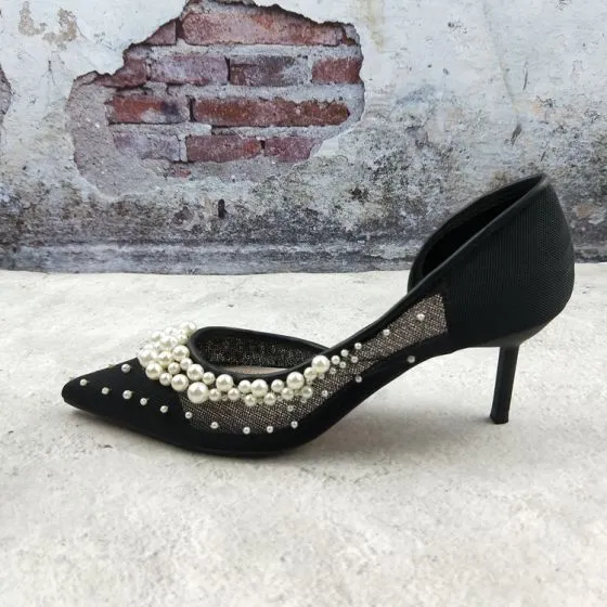 black heels with pearls on them