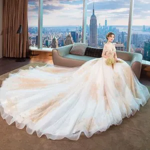 off white and gold wedding dresses
