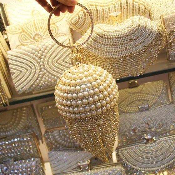 gold round clutch bag