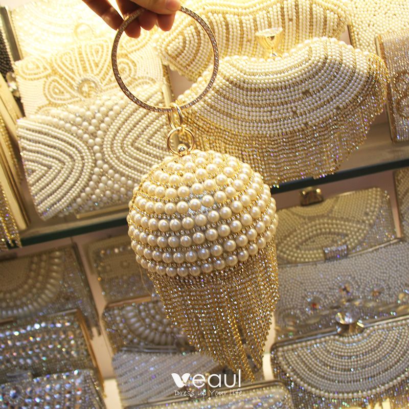 round gold clutch bag