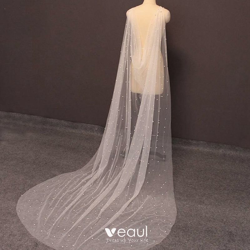 https://img.veaul.com/product/83d9067ad96ed456a00425e92741a798/chic-beautiful-ivory-handmade-pearl-wedding-veils-2023-800x800.jpg