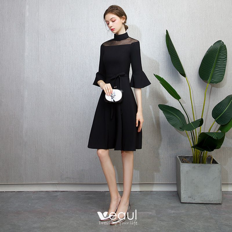 black dress with bell sleeves knee length