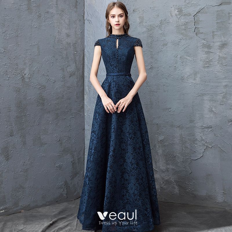 navy blue formal gown with sleeves