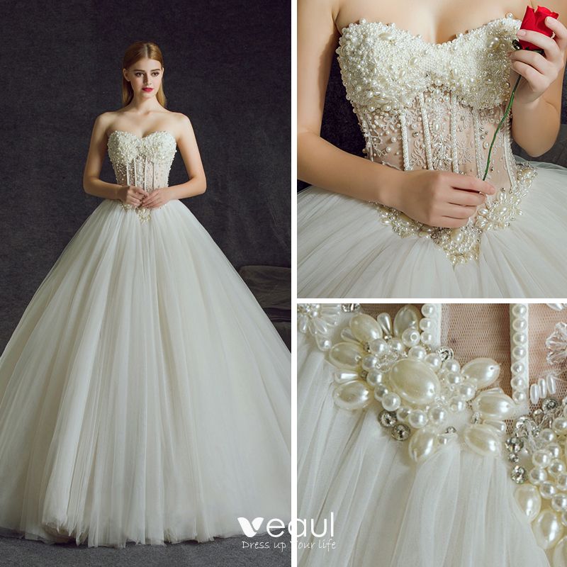 Illusion Ivory Pierced Wedding Dresses 2018 Ball Gown Sweetheart