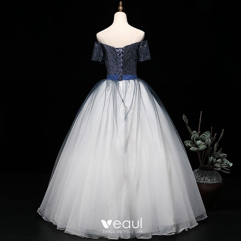 navy blue and white gown
