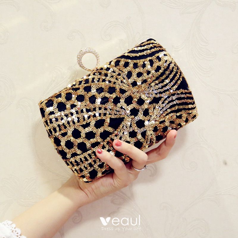 black and gold clutch bag