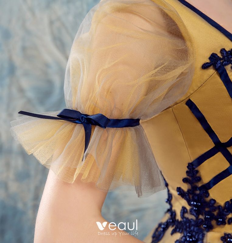 silver and yellow outfit