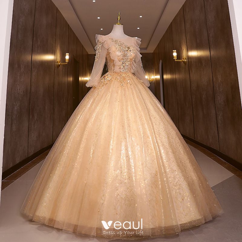 https://img.veaul.com/product/bc33c6ac6fe43b8d1119621d186549d3/sparkly-champagne-glitter-beading-pearl-sequins-prom-dresses-2022-ball-gown-scoop-neck-long-sleeve-backless-floor-length-long-formal-dresses-800x800.jpg