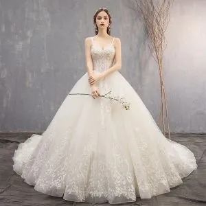 Best Ivory Wedding Dresses 2019 Ball Gown Spaghetti Straps Sleeveless Backless Appliques Lace Beading Chapel Train Ruffle