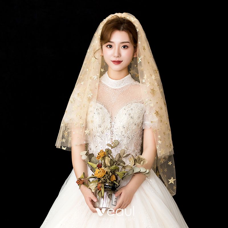 https://img.veaul.com/product/c765af7a81ea2228719785a0ff14b1af/sparkly-bling-bling-champagne-wedding-veils-2020-short-tulle-sequins-star-wedding-accessories-800x800.jpg