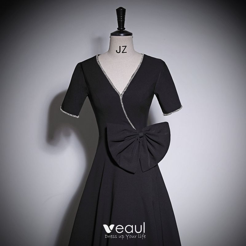 https://img.veaul.com/product/f08e71caa5e0144a894f7c6c5073302b/elegant-black-rhinestone-bow-prom-dresses-2023-zipper-up-a-line-princess-v-neck-short-sleeve-floor-length-long-prom-formal-dresses-800x800.jpg