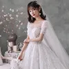 Victorian Style Ivory Bridal Wedding Dresses 2020 Ball Gown See-through Scoop Neck Puffy Short Sleeve Backless Beading Tassel Glitter Tulle Cathedral Train Ruffle